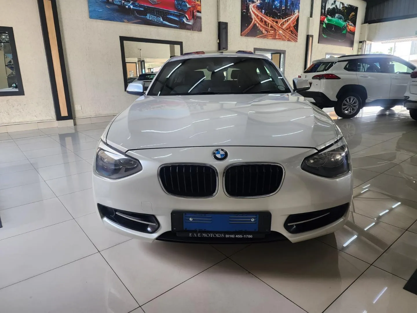 2014 BMW 1 Series 118i 5-Door Auto, photo 5 of 9